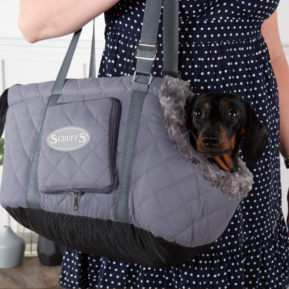Grey Wilton Dog Carrier Bag on a lady's shoulder- Pet Carrier by Scruffs®